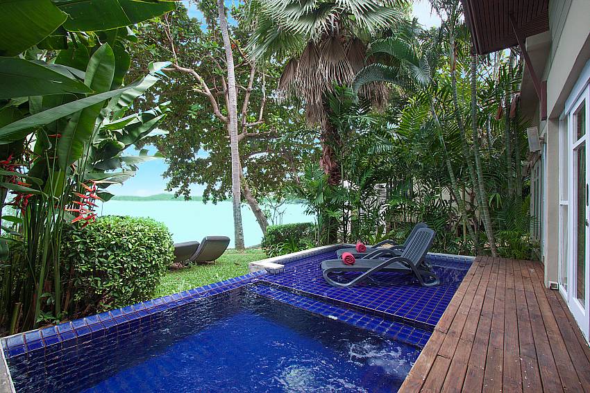Sun bed near swimming pool with sea view Villa Hutton 212 in Koh Samui