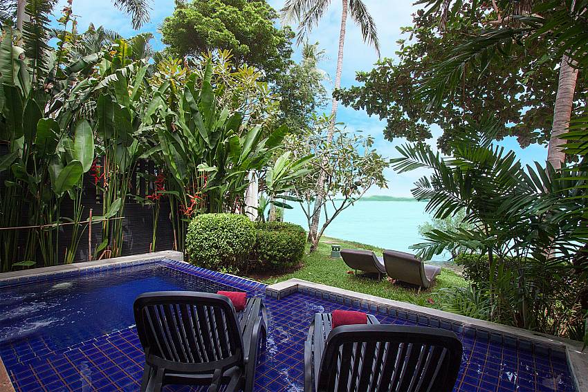 Sun bed near swimming pool with sea view Villa Hutton 212 in Koh Samui