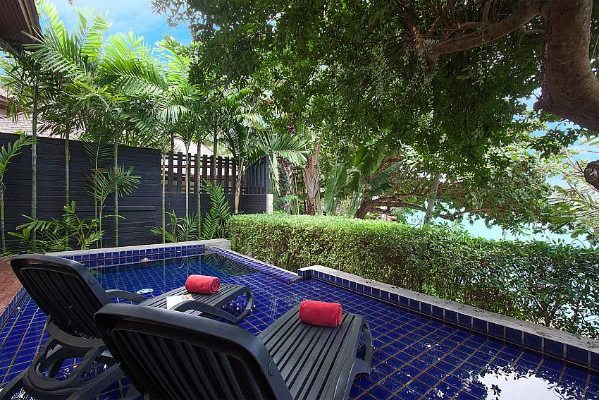 Sun bed near swimming pool with sea view Villa Hutton 214 in Koh Samui 