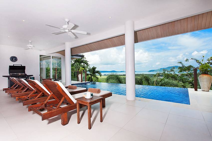 Comfortable sun beds by the private pool at Villa Alangkarn Andaman Phuket