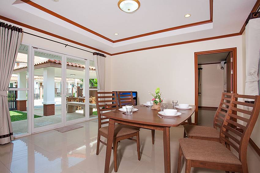 Dinning area with TV Timberland Lanna Villa 402 in Bangsaray Pattaya