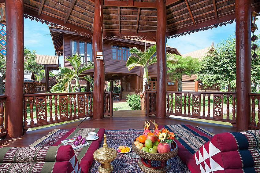 Seat area in garden Timberland Lanna Villa 202 in Pattaya