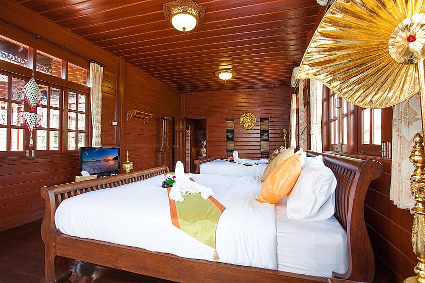 Bedroom with TV Timberland Lanna Villa 202 in Pattaya