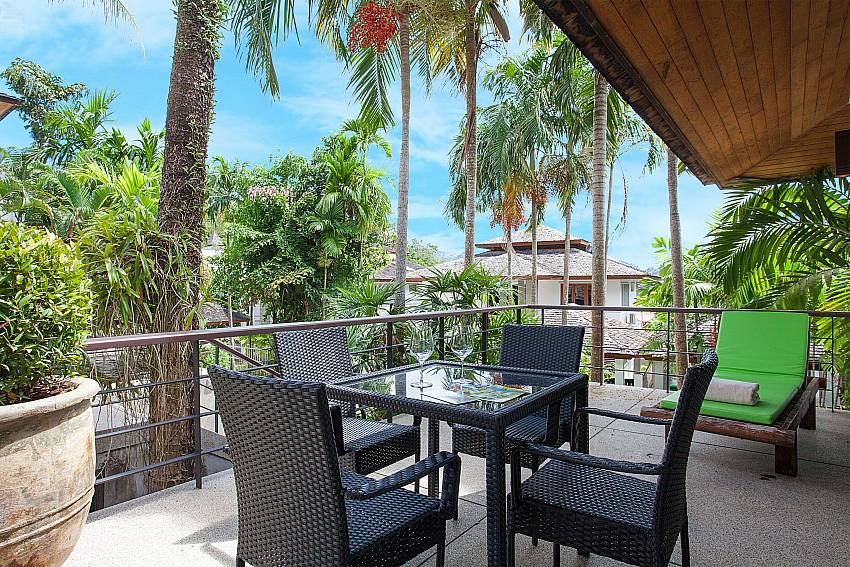 Outdoor dining table with view at Nirano Villa 24 in Phuket