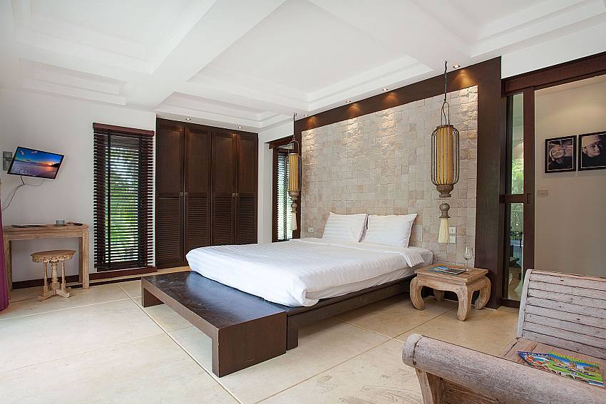 Master bedroom with king size bed and TV Nirano Villa 24 Phuket