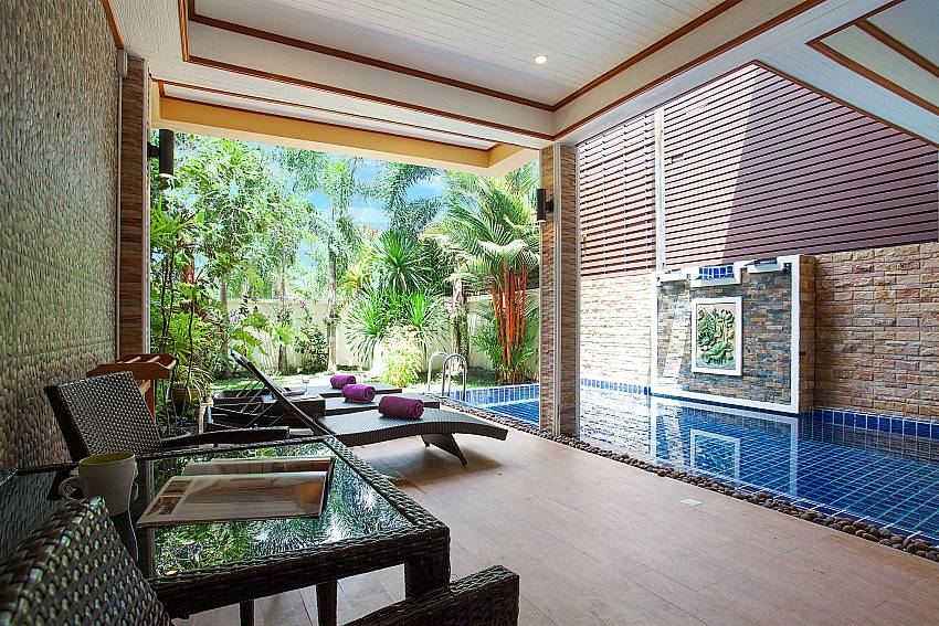Sun bed near swimming pool BangTao Tara Villa 5 in Phuket