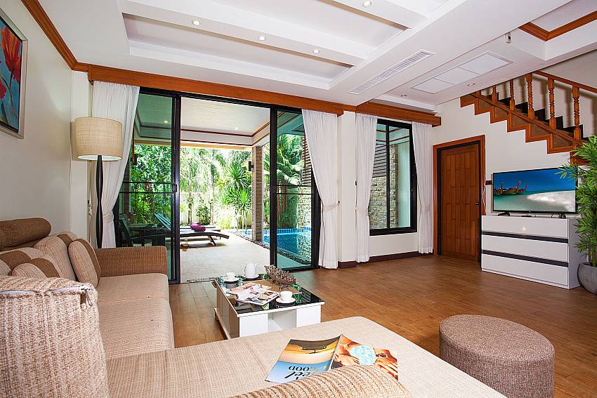Living room with TV BangTao Tara Villa 5 in Phuket