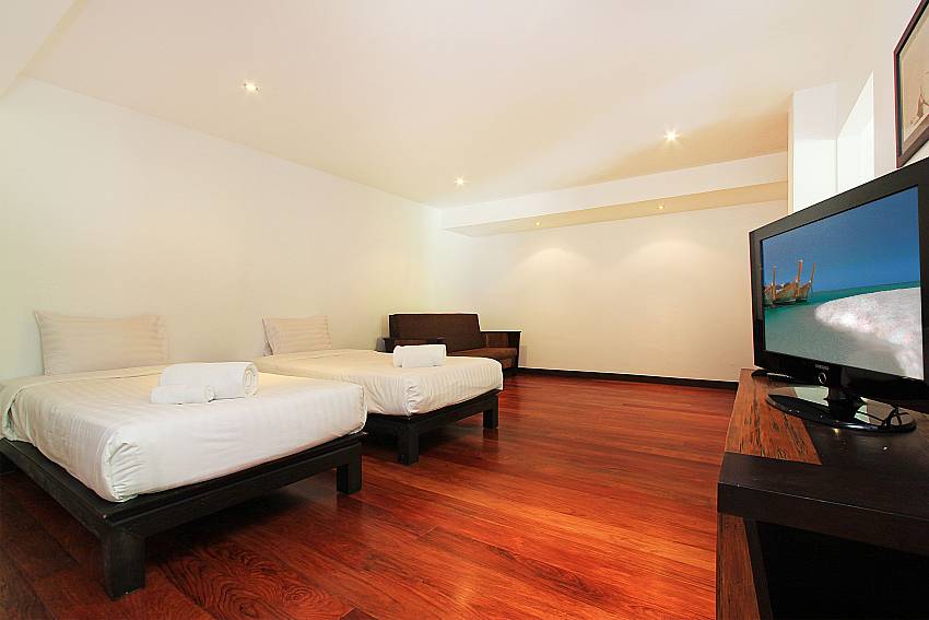2 single beds and TV in 3. bedroom of Nirano Villa 41 Phuket