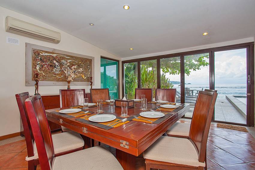 Villa Balie dining table with sea view at Kalim beach Phuket