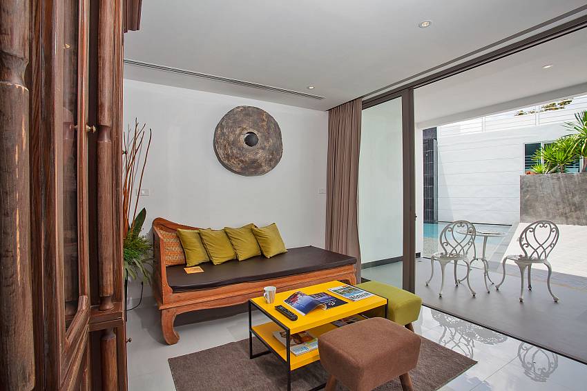 Living room at Sadhay B1 Condo with direct pool access in Patong Phuket