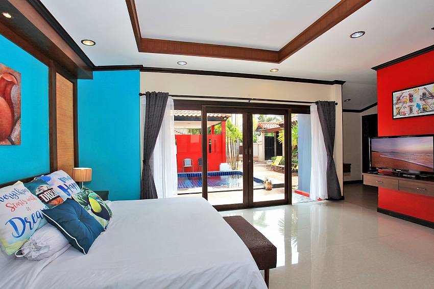1. double bedroom with TV and pool access in Fandango Villa Pattaya