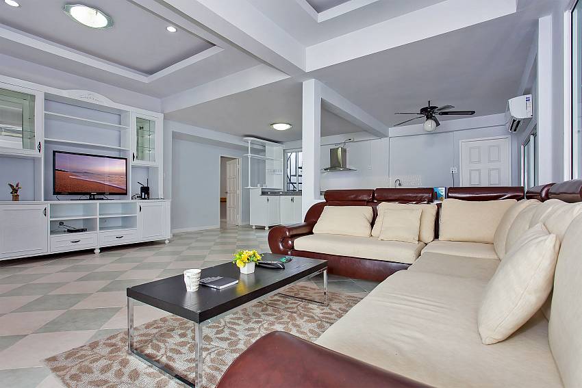 Open plan living room with flat TV in Vogue Villa Pattaya