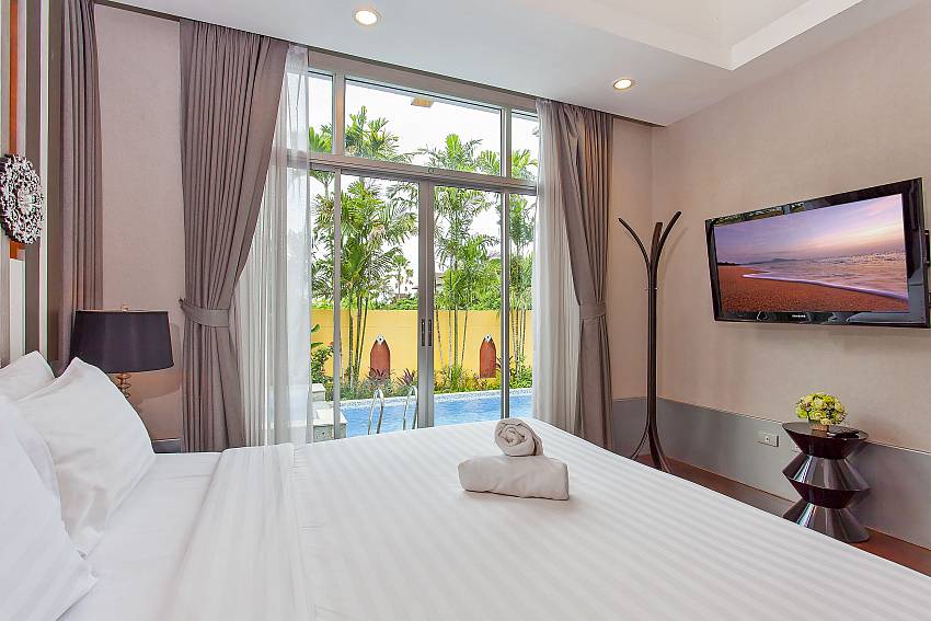 Master bedroom with flat TV and direct pool access Silver Sky Villa Central Pattaya