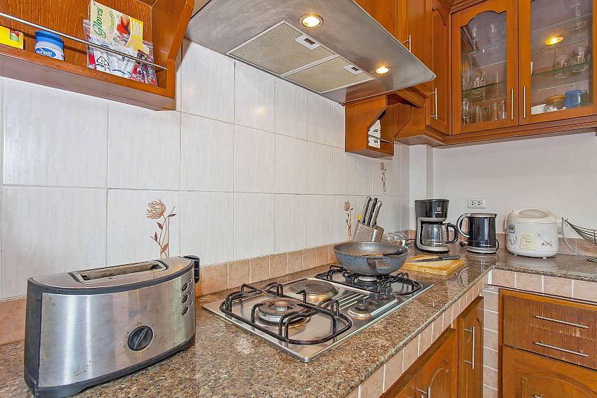 gas hob and lots of appliances in the kitchen of Villa Klasse pattaya