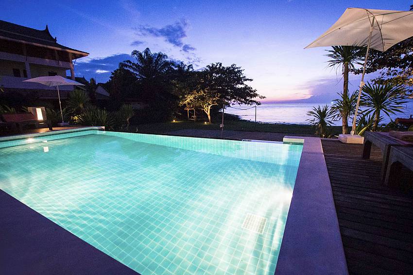 The Pool at night-baan-hat-kai-mook_4-bedroom_beachfront-private-pool-villa_koh-chang_thailand