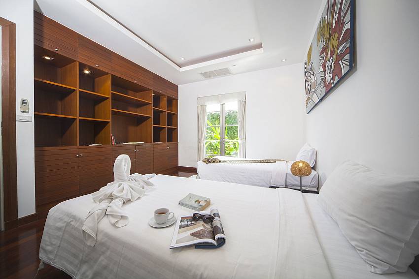 Twin Bedroom with shelves Of Villa Panak