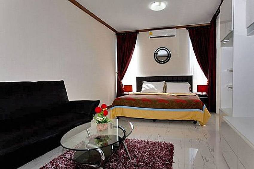 Bedroom with comfortable sofa Of Baan Chomjan