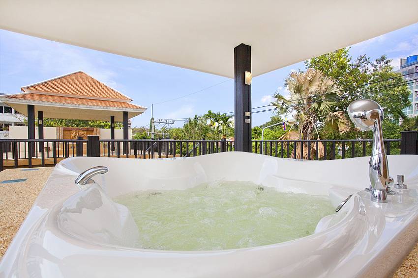 Jacuzzi tub outside Of Baan Tanna A