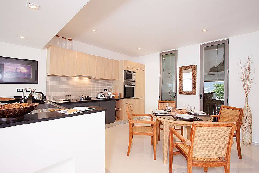 Kitchen and Dining Table_seductive-sunset-patong-a1_apartment_private-pool_patong_phuket_thailand