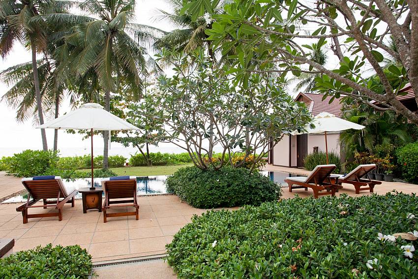 Sun bed near the pool Of Pimalai Beach Villa 1 Bedroom Luxury Property in Koh Lanta