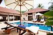 Sun bed by the pool Of Pimalai Beach Villa 2 Bedroom Beachfront Suite in Koh Lanta