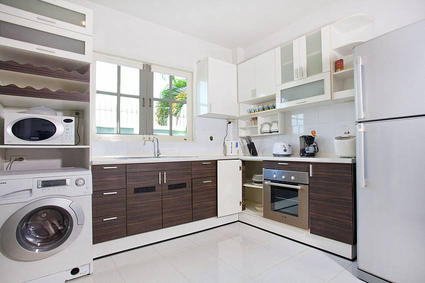 Kitchen room with refrigerator and washing machine Of Jomtien Seaboard Villa