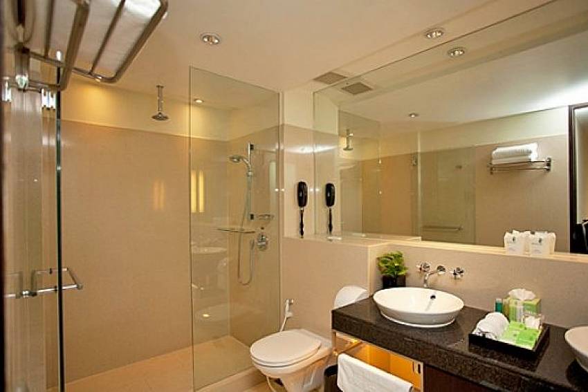 Shower with toilet Of Sala Daeng Deluxe Suite Room 605