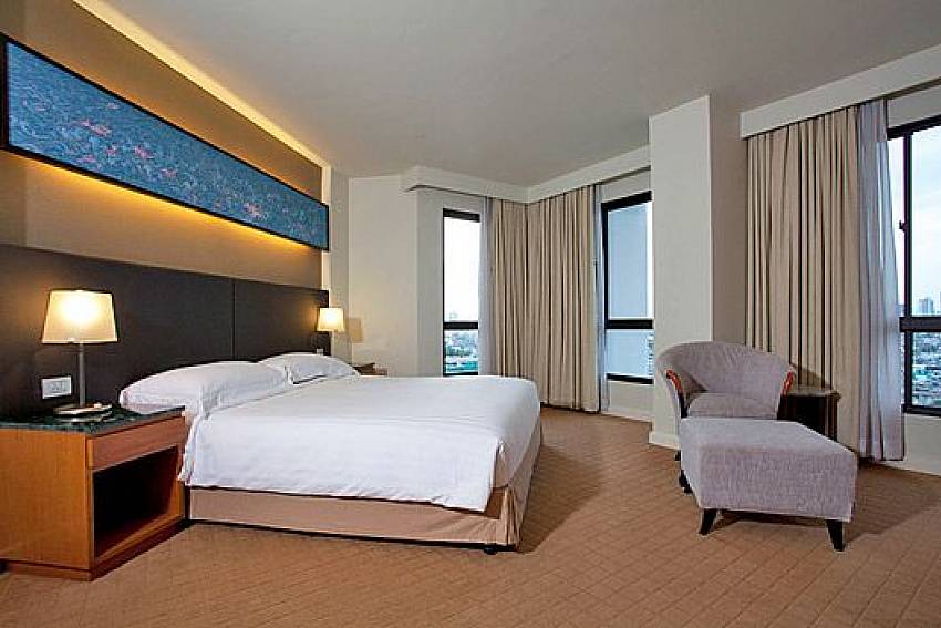 Bedroom with sofa Of Sathorn Suite Room 5151 (Third)