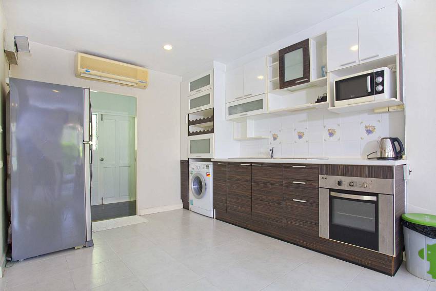 Kitchen room with refrigerator and microwave oven Of Villa Bliss Jomtien Modern