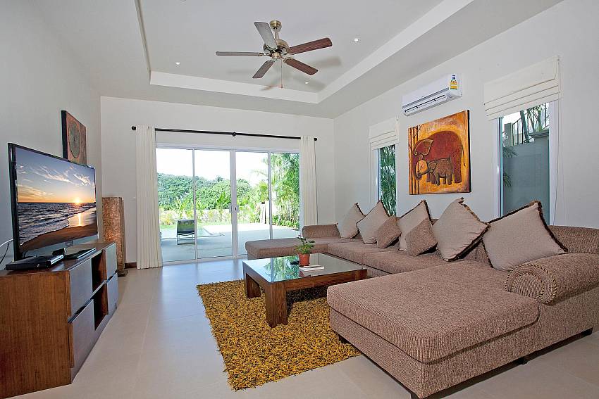 Living room with TV see views Of Villa Yok Kiao