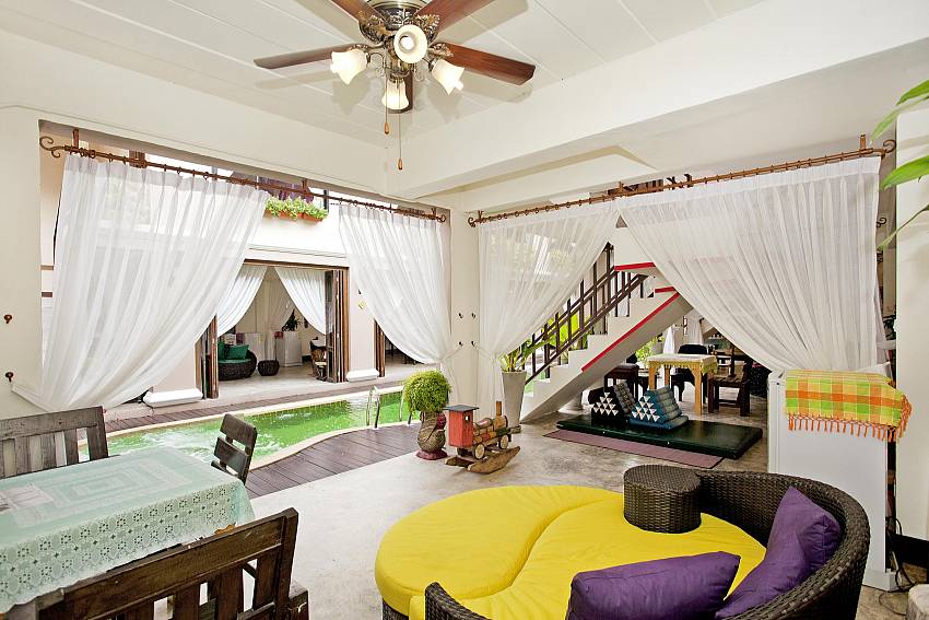 Lounging in the house overlooking the pool Of Jomtien Lotus Villa