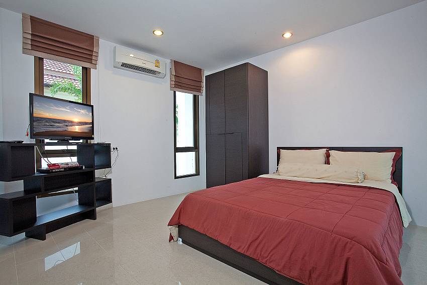 Bedroom views with TV and wardrobe Of Chalong Sunshine Villa (First)