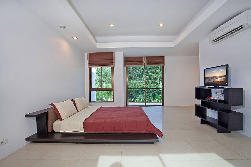 Bedroom views with TV Of Chalong Sunshine Villa (Four)