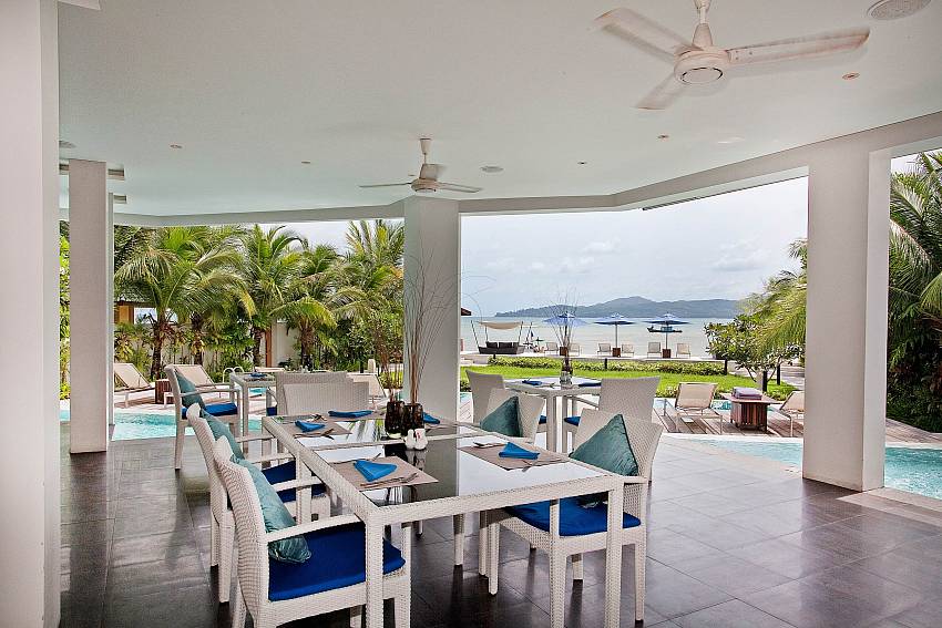 Dinning table outside see views Of Bang Tao Beach-Front Penthouse