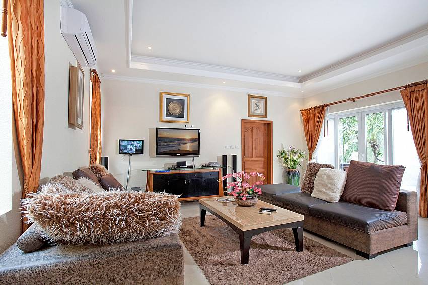 Living room with TV see views Of Villa Pratumnak Elite