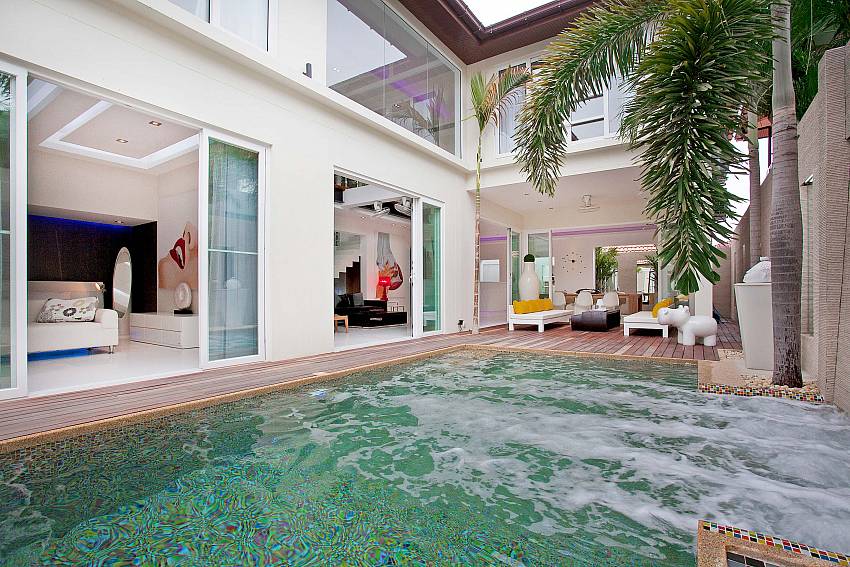 The house has a bedroom next to the swimming pool Of Classic Pratumnak Villa