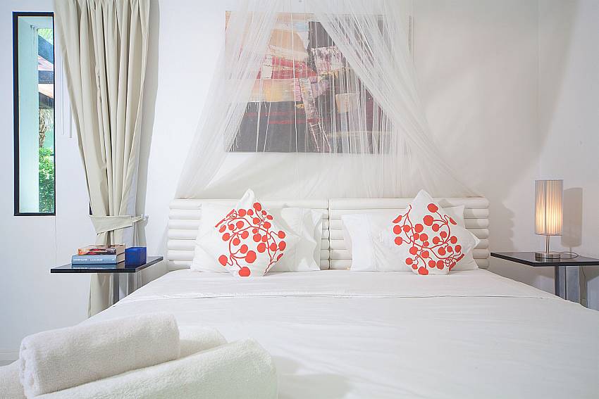 Master bedroom with king size bed at Villa Chabah Phuket