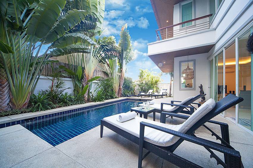 Relax on the comfortable sun beds by the private pool Villa Romeo West Phuket