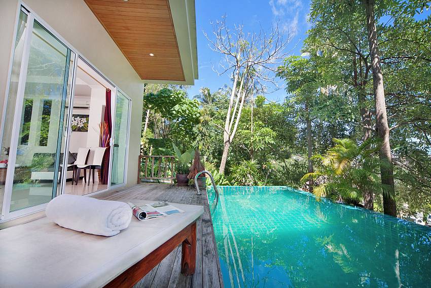 Sun bed by the pool Of Karon Hill Villa 16