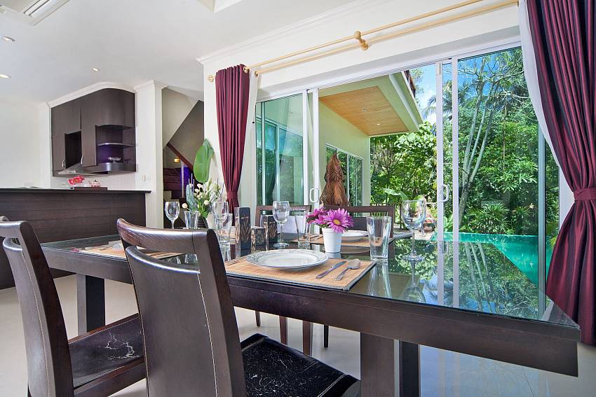 Dinning table in the house near the pool Of Karon Hill Villa 16