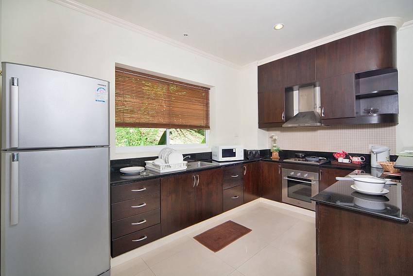 Kitchen room with refrigerator Of Karon Hill Villa 16