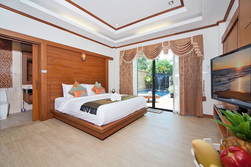 Bedroom with TV see views Of BangTao Tara Villa 2 (Second)