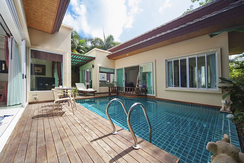 Swimming pool with sun bed Of Karon Hill Villa 4