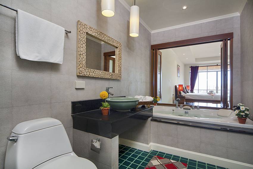 Toilet with jacuzzi tub and basin wash Of Karon Hill Villa 20