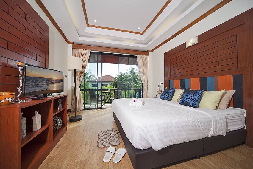 Bedroom with TV and shelves Of BangTao Tara Villa 4 (Second)