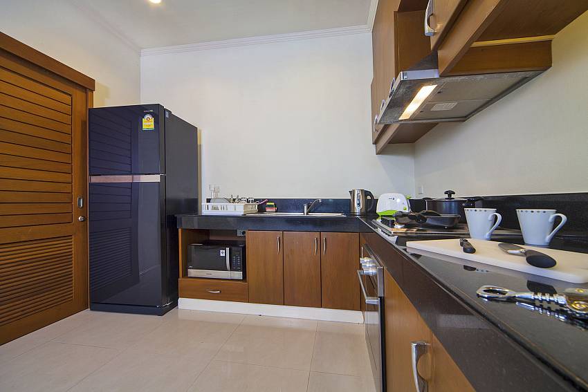 Kitchen room with refrigerator Of Karon Hill Villa 19