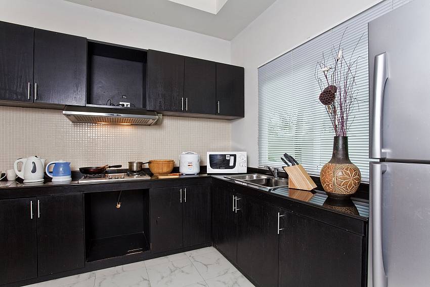 Kitchen room with refrigerator Of Villa Cesadelsol
