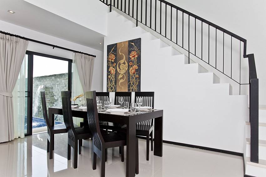 Dinning table near the ladder Of Classical Villa 1