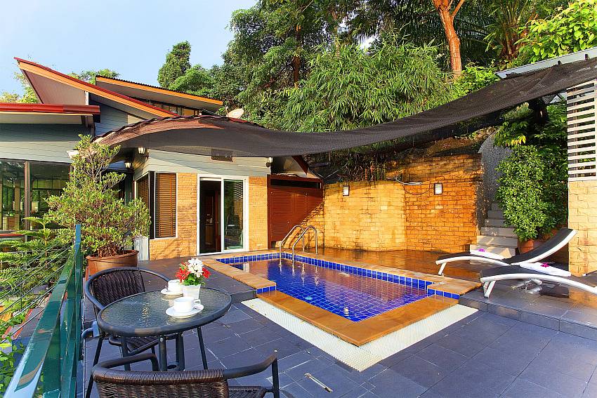 Coffee table near the pool Of Krabi Sunset Hill Villa