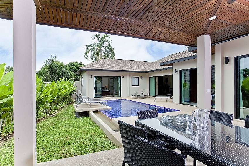 Dinning table outdoor near the pool Of Sri Nin Pool Villa